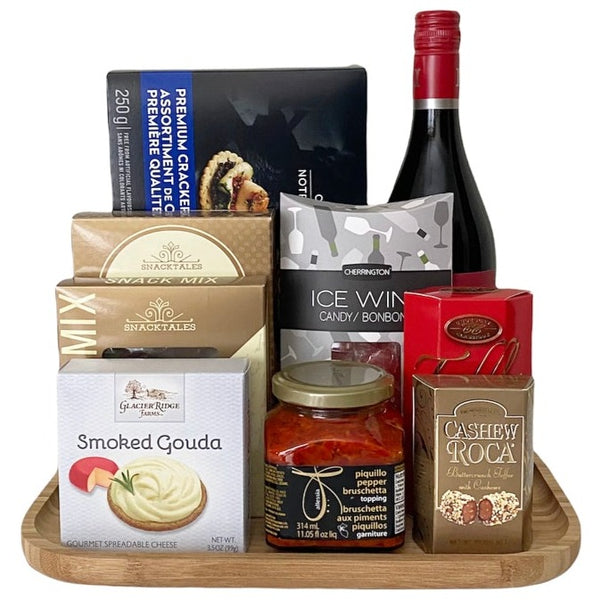 Wine and cheese is a great gift for all occasions. Curated with premium crackers, cheese, bruschetta sauce and other products to make your own charcuterie tray.